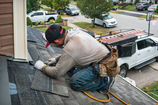 Professional Roof Leak Repair technician working in North Pembroke, MA
